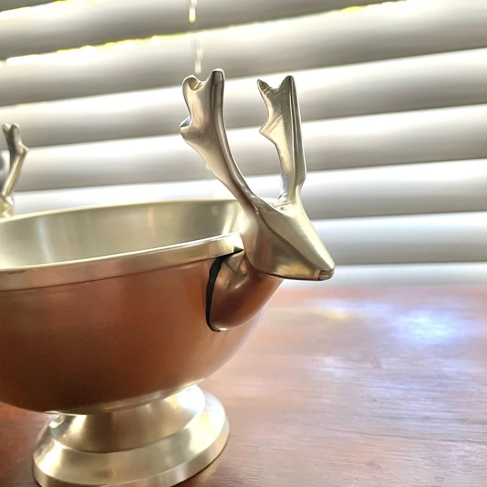 Pair of Crate&Barrel modern reindeer holiday stainless steel footed bowls, 6”